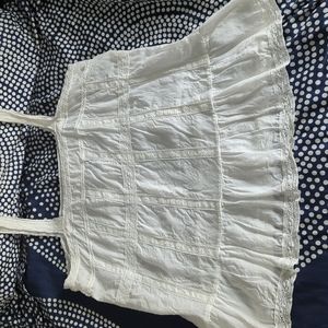 White cotton and lace Zadig & Voltaire peplum tank.